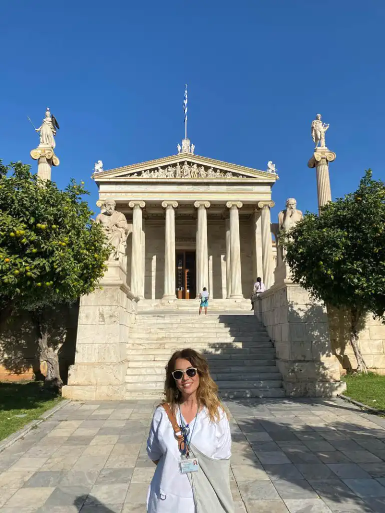 Elena Gaitani, Greek private guide, posing at an ancient site in Greece.